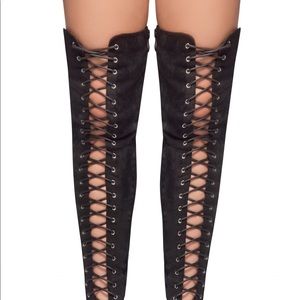 Thigh high lace up boots
